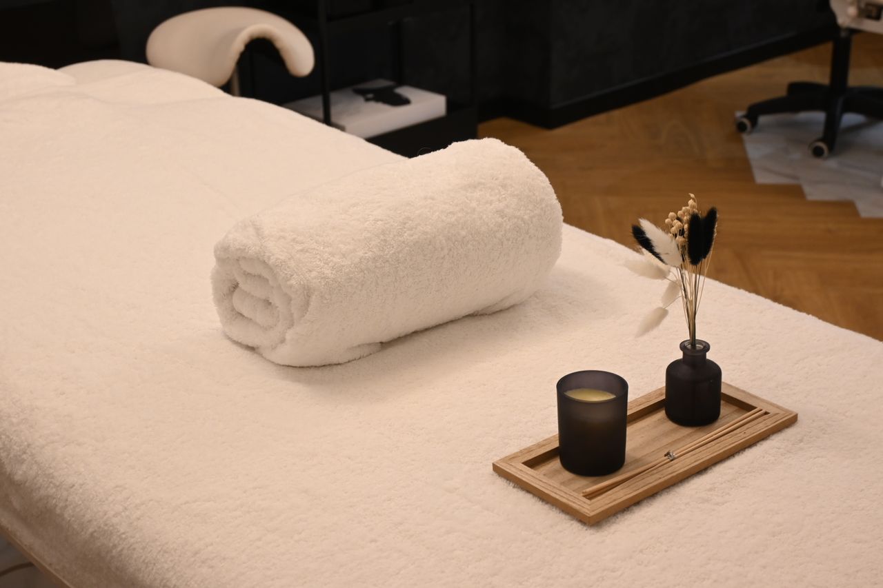 Prepared spa treatment table with candle tray